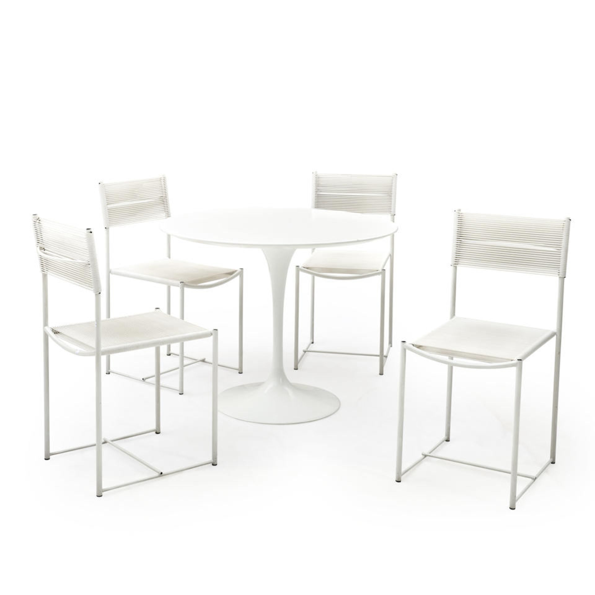 FOUR WHITE ALIAS SPAGHETTI CHAIRS AND A WHITE KNOLL-STYLE TABLE