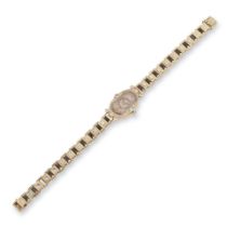 LADY'S ONYX AND DIAMOND MANUAL WIND COCKTAIL WATCH, CIRCA 1940 MONTRE DE DAME ONYX ET DIAMANTS, ...