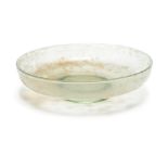 A Roman green glass dish