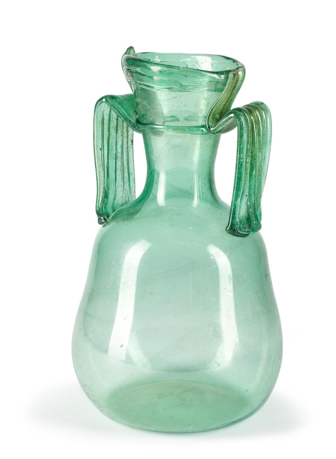 A large Roman green glass amphora