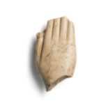 An Egyptian indurated limestone right hand