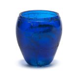 A Hellenistic cobalt blue glass beaker with wheel-cut bands