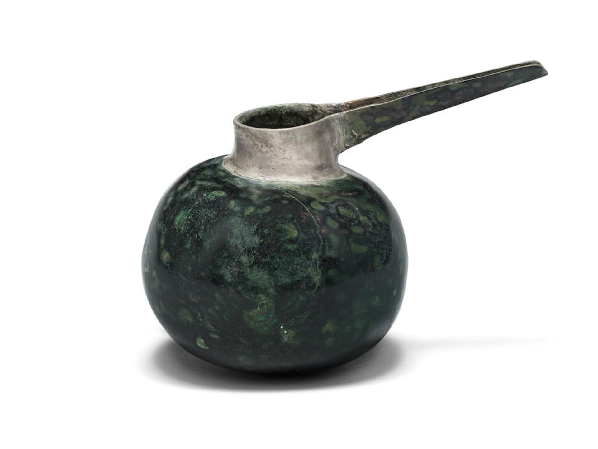 An Elamite bronze and silver spouted vessel