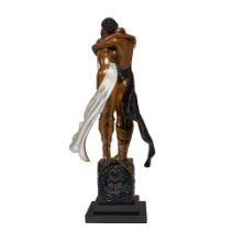 AN ERTÉ COLD PAINTED AND PATINATED BRONZE FIGURAL GROUP: LOVERS AND IDOLErté (Romain d...