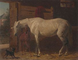 Emil Volkers (German, 1831-1905) A white horse and a brown foal in a stable; Protecting the foal...