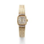 KRAEMER: LADY'S GOLD AND DIAMOND BRACELET WATCH KRAEMER: MONTRE BRACELET DE DAME OR ET DIAMANTS