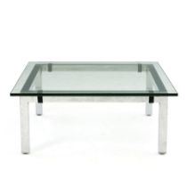 A CHROME AND GLASS LOW TABLE,