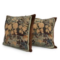 A PAIR OF FLEMISH VERDURE TAPESTRY FRAGMENTS AS CUSHIONS,