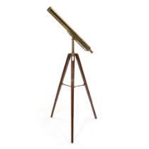 A BRASS TELESCOPE ON STAND,