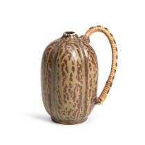 AN ARNE BANG GLAZED STONEWARE PITCHER, Denmark, 1930s-1940s, gourd-form with cane handle, signed...