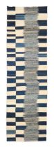 A FLATWEAVE RUNNER,