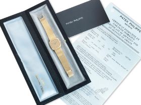 Patek Philippe. An 18ct gold bracelet watch Ellipse Fantaisie, Ref: 3556/1, Certificate dated 1973