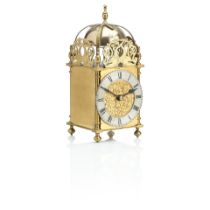 A 20th century brass cased lantern clock Engraved Edwards and Sons Glasgow