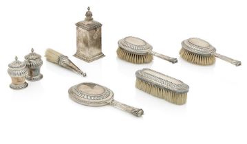 A William and Mary style silver toilet set Chrichton Brothers, London, 1928/1932/1934 (8)