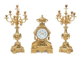 A late 19th early 20th century French ormolu clock garniture