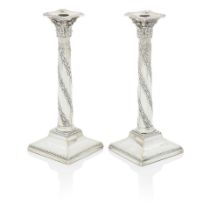 A Pair of Victorian neoclassical silver candlesticks, By Elkington and Co. of Birmingham, 1897