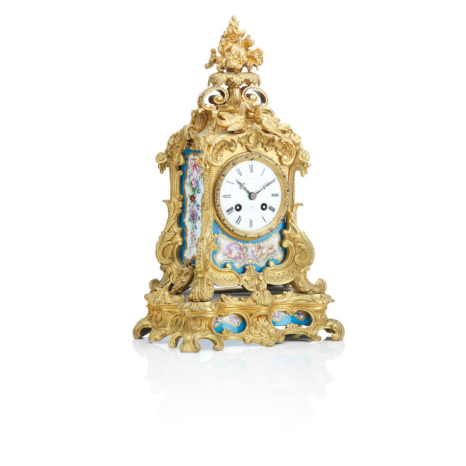 A 19th century ormolu and Sevres style porcelain mounted mantel clock, by Raingo The movement s...