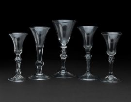 A collection of light baluster wine glasses mid-18th century