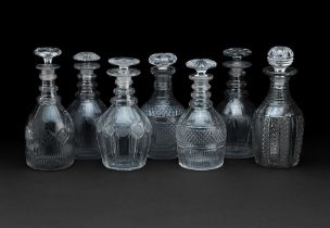 A Collection of seven Georgian glass decanters and stoppers Early 19th century