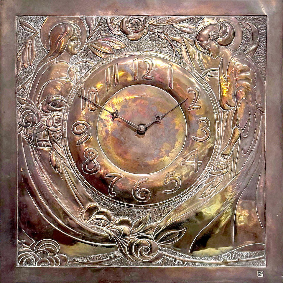 Margaret Gilmour (Scottish 1860-1942) An Arts and Crafts repoussé brass wall clock