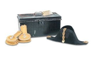 A 20th century cased Royal Navy bicorn hat, set of epaulettes and belt Formally belonging to Com...