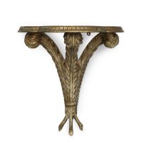 A carved giltwood console tableFirst-half 20th centuryFirst seen in Season 5, in the Diana Kensi...