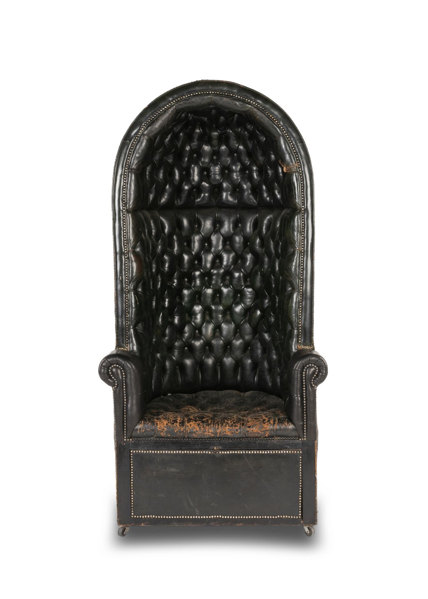 An early 20th century black leather close-nailed upholstered porter's chairFirst sourced for Sea...