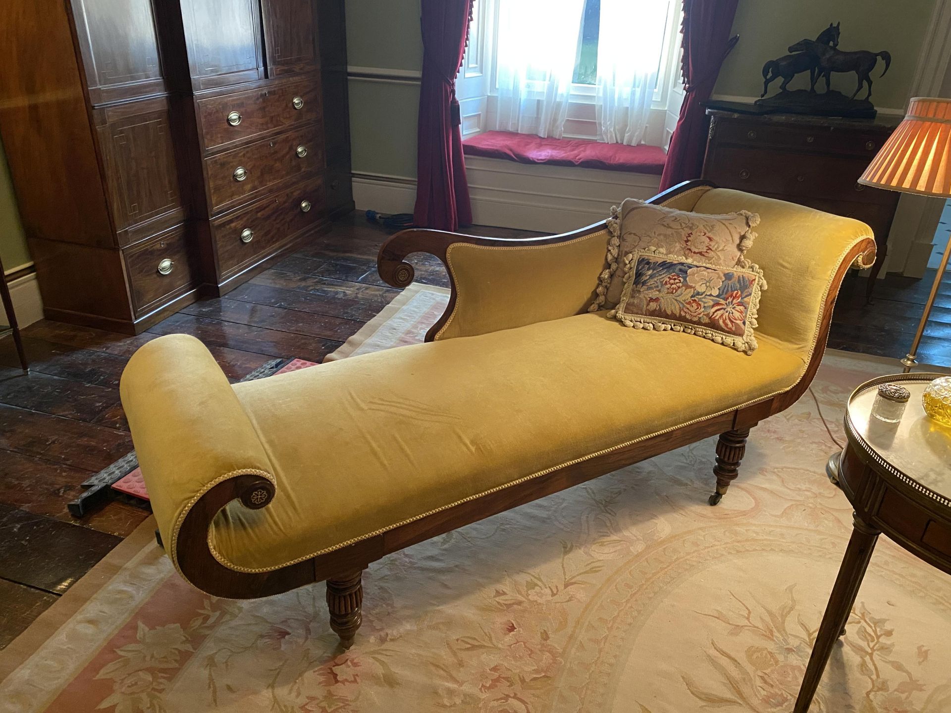 A Regency rosewood, mahogany and cut-brass inlaid chaise longueFirst seen in Season 2, in the Qu...