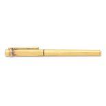 Cartier. A gold plated fountain pen with red lacquer Trinity, Circa 1990