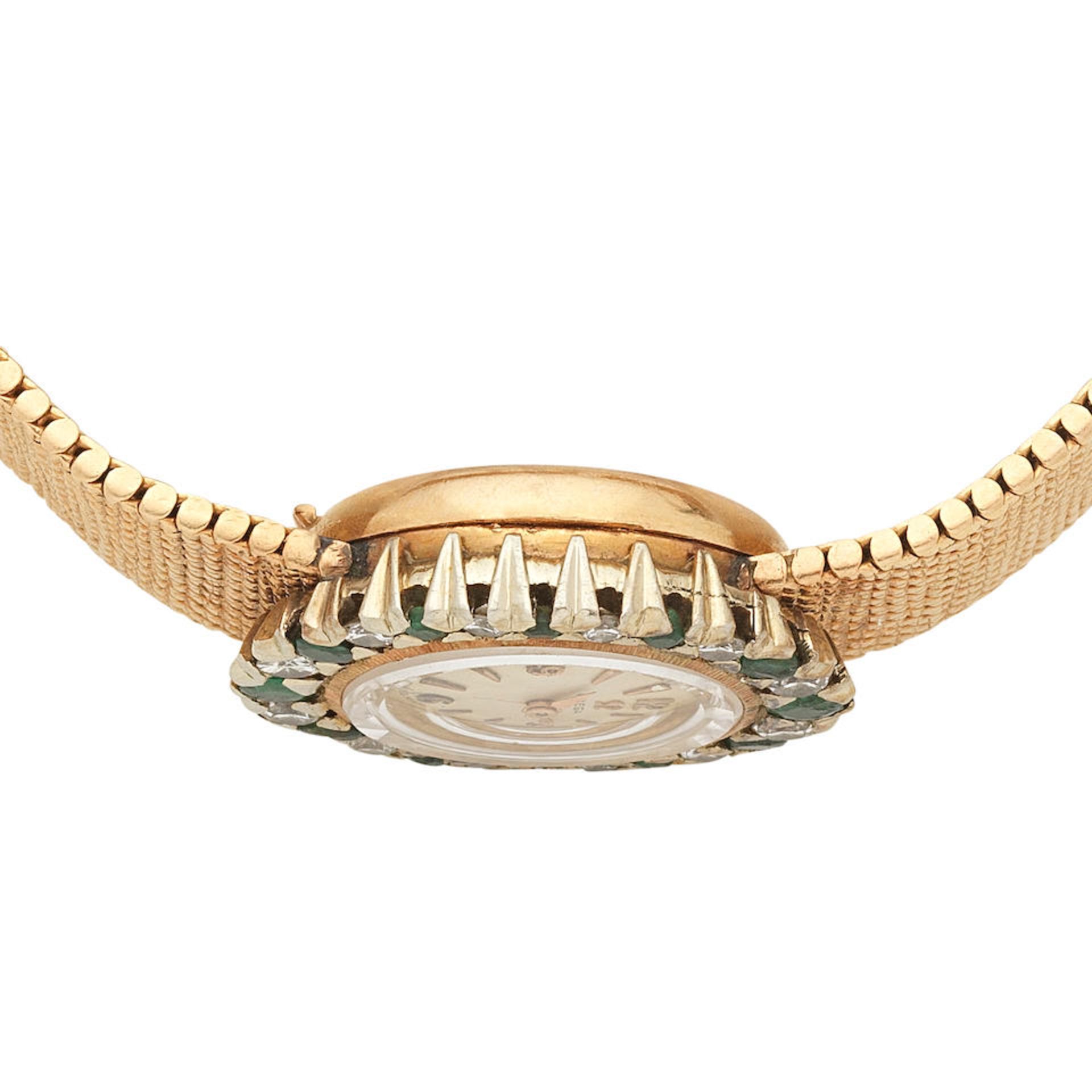 Omega. A lady's 18K gold diamond and emerald set manual wind bracelet watch Circa 1960 - Bild 2 aus 4