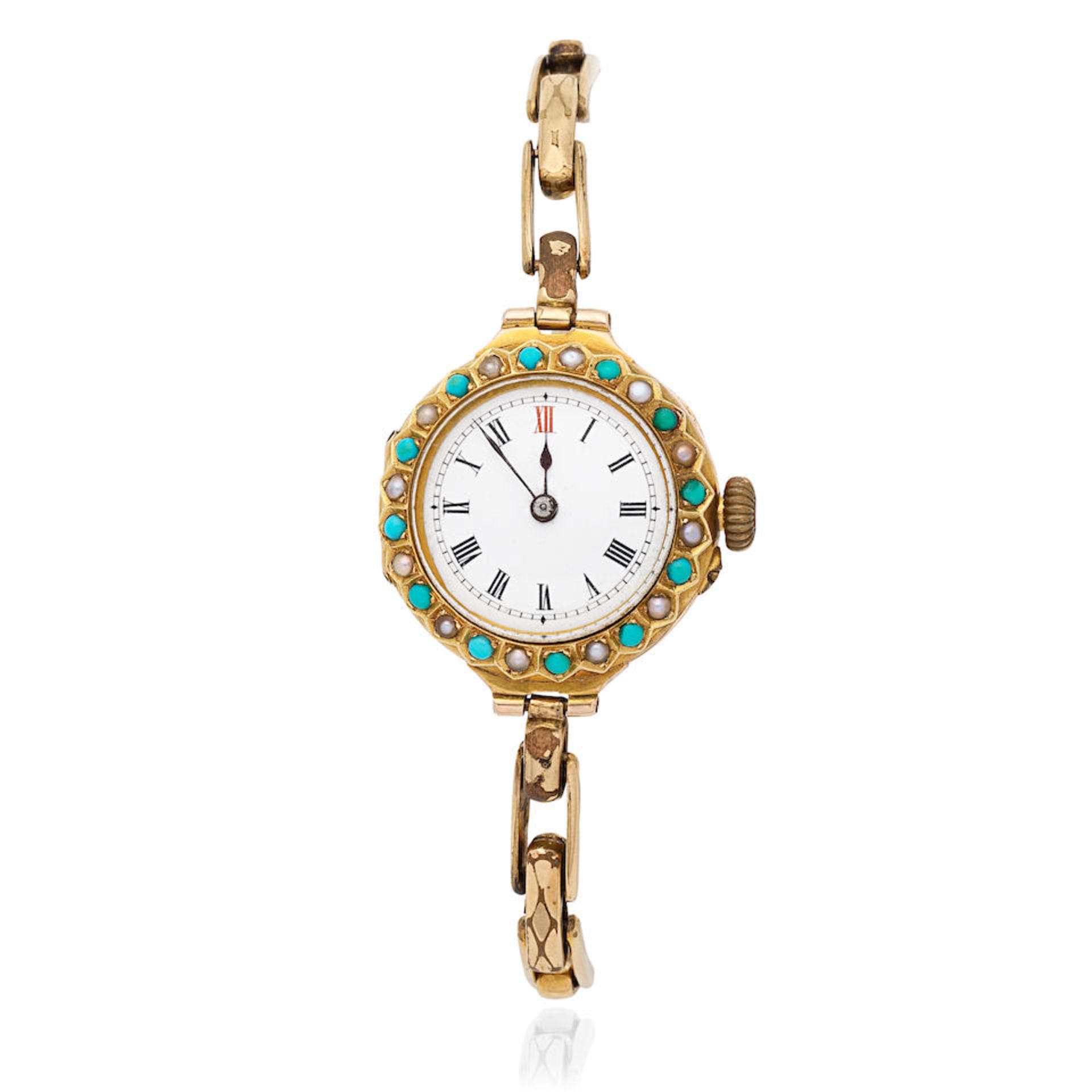 A 9K gold manual wind bracelet watch with seed pearl and turquoise set bezel Circa 1920