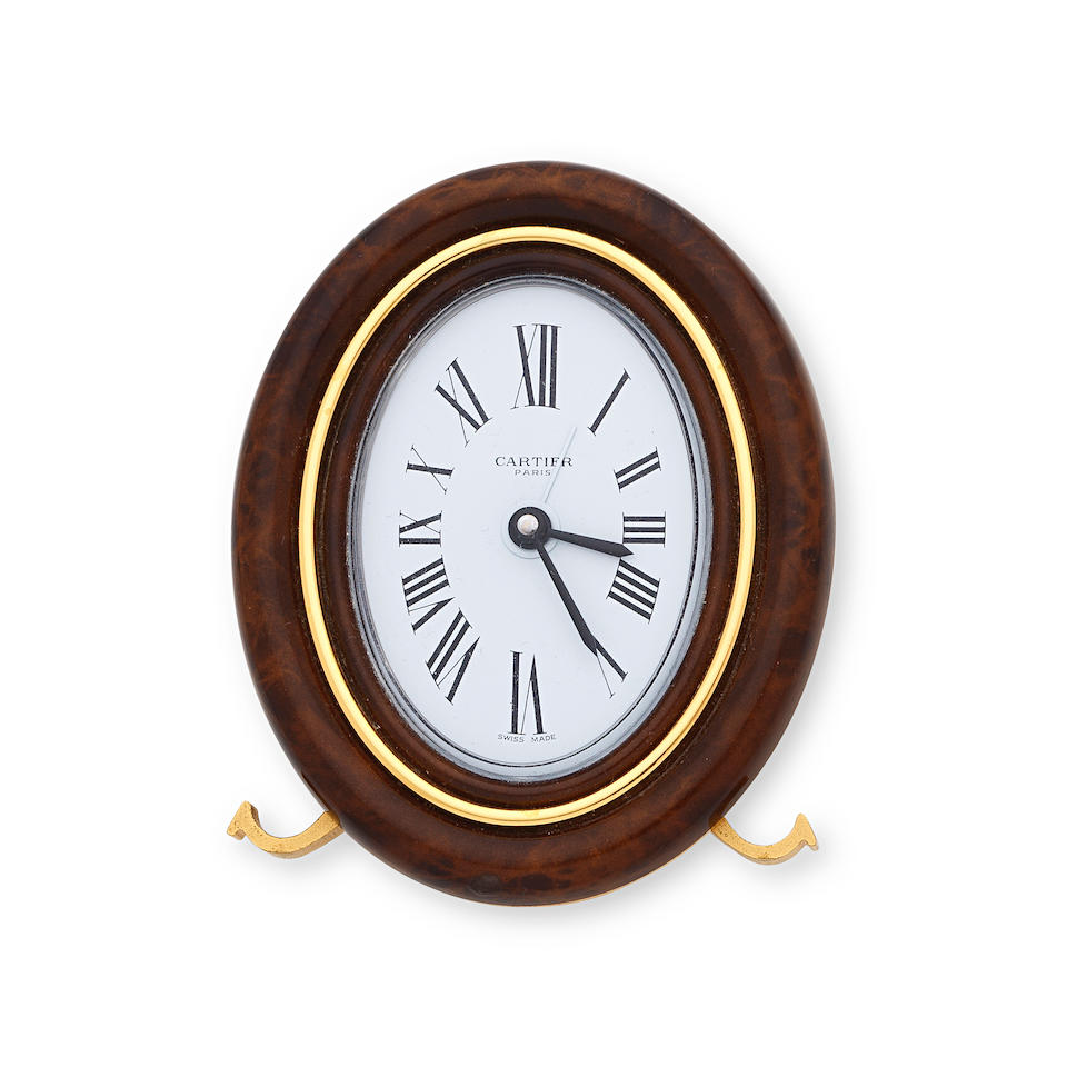 Cartier. A gilt brass desk clock with alarm Ref: 7519, Circa 1980