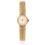 Tissot. A lady's 18K gold manual wind bracelet watch Circa 1980