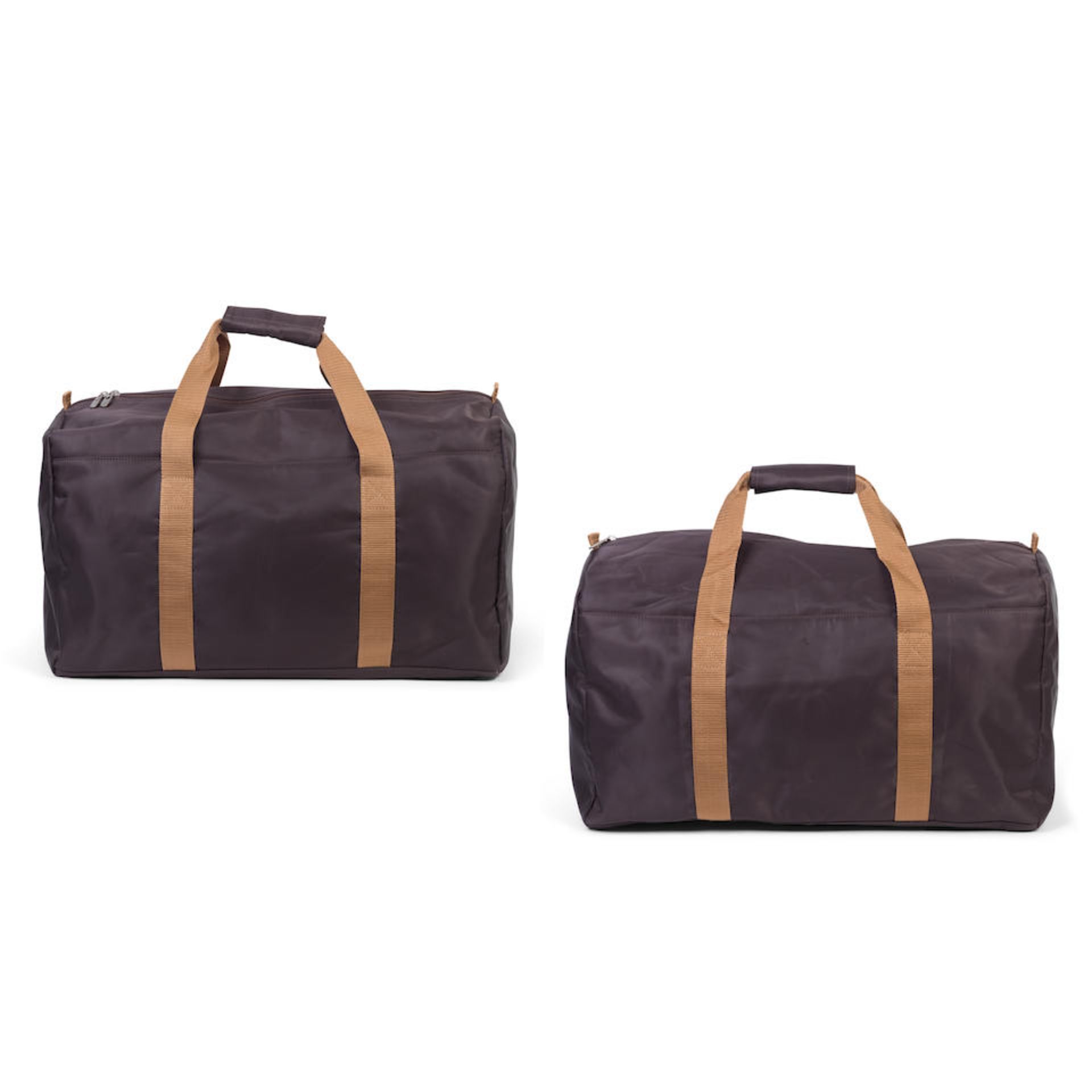 Patek Philippe. A lot of two brown nylon duffle bags