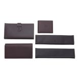 Patek Philippe. A lot of three leather wallets and two watch service cases (5) Circa 2010