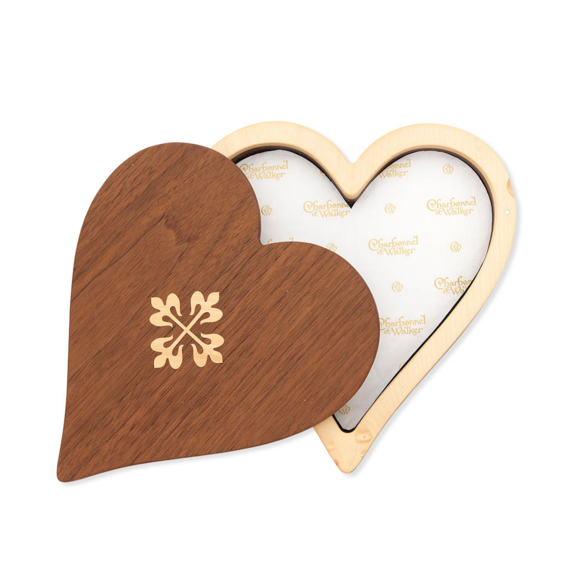 Patek Philippe. A wooden heart shaped chocolate box Circa 2010