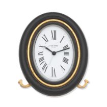 Cartier. A gilt brass desk clock with alarm Ref: 7509, Circa 1980