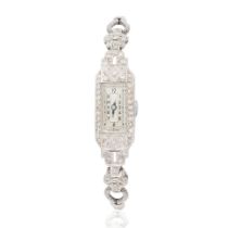 A platinum diamond set manual wind cocktail watch with 9K white gold bracelet Circa 1930