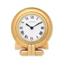 Cartier. A gilt brass desk clock with alarm Colisee, Circa 1990