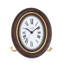 Cartier. A gilt brass desk clock with alarm Ref: 7509, Circa 1980