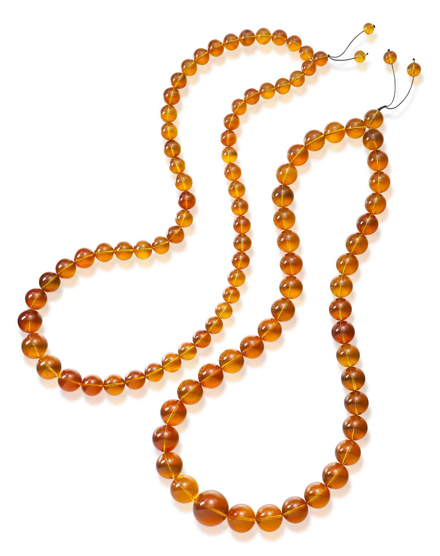 TWO AMBER BEAD NECKLACES (2)