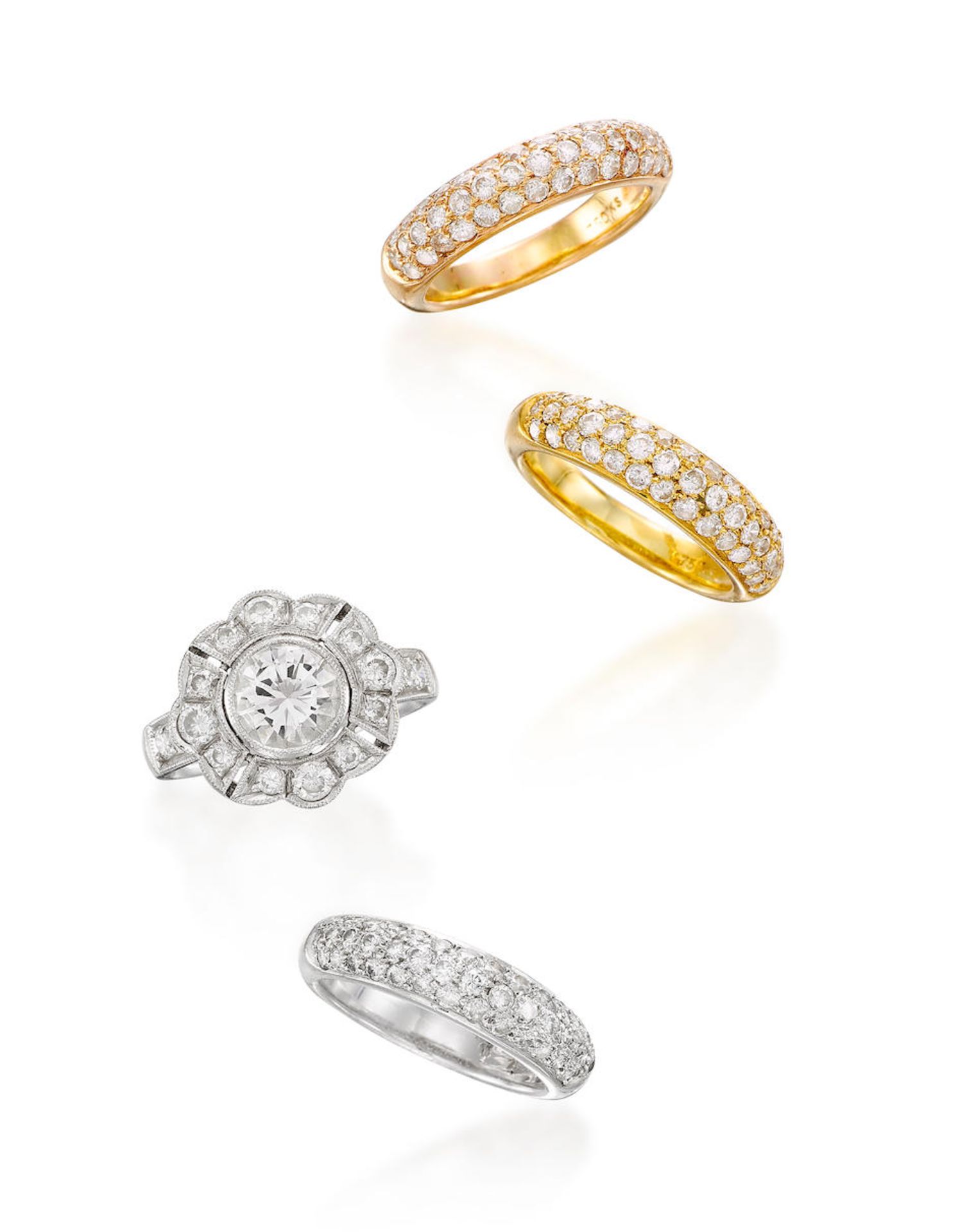 FOUR DIAMOND RINGS (4)