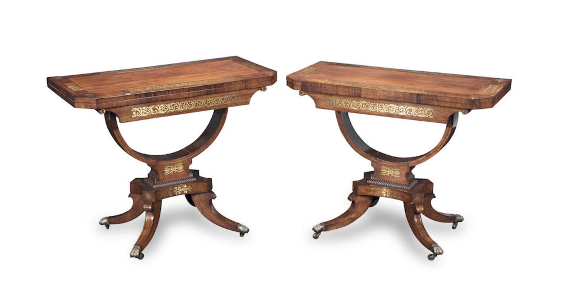A pair of George IV rosewood and brass inlaid card tables (2)