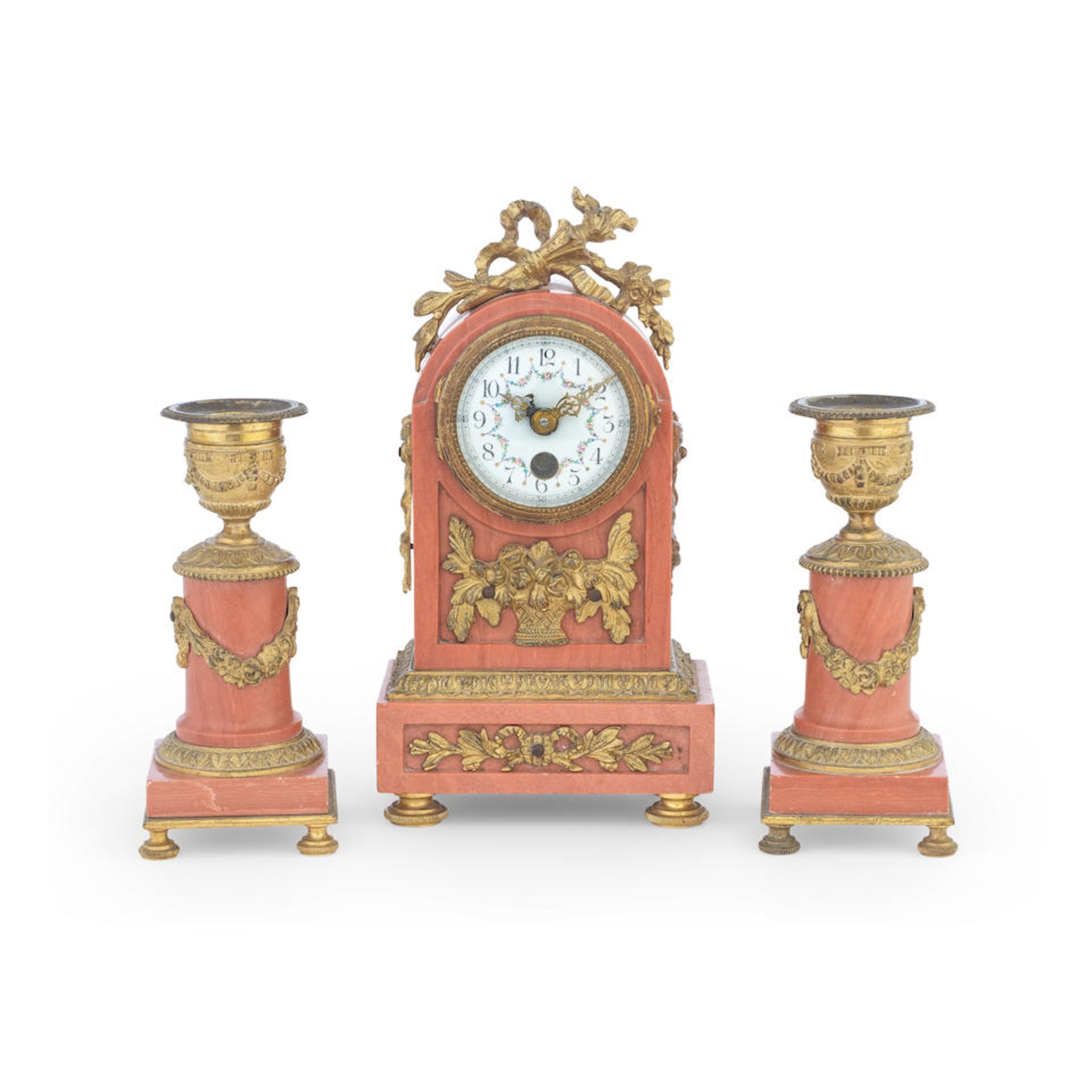 An early 20th century and later French gilt brass mounted pink marble boudoir timepiece garnitur...