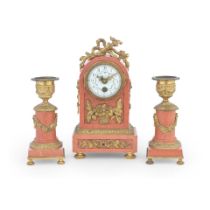 An early 20th century and later French gilt brass mounted pink marble boudoir timepiece garnitur...