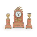 An early 20th century and later French gilt brass mounted pink marble boudoir timepiece garnitur...