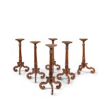 A set of six Dutch walnut and yew wood candle stands (6)