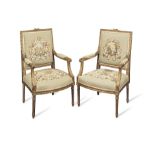 A pair of early 20th century fauteuils in the Louis XVI style (2)