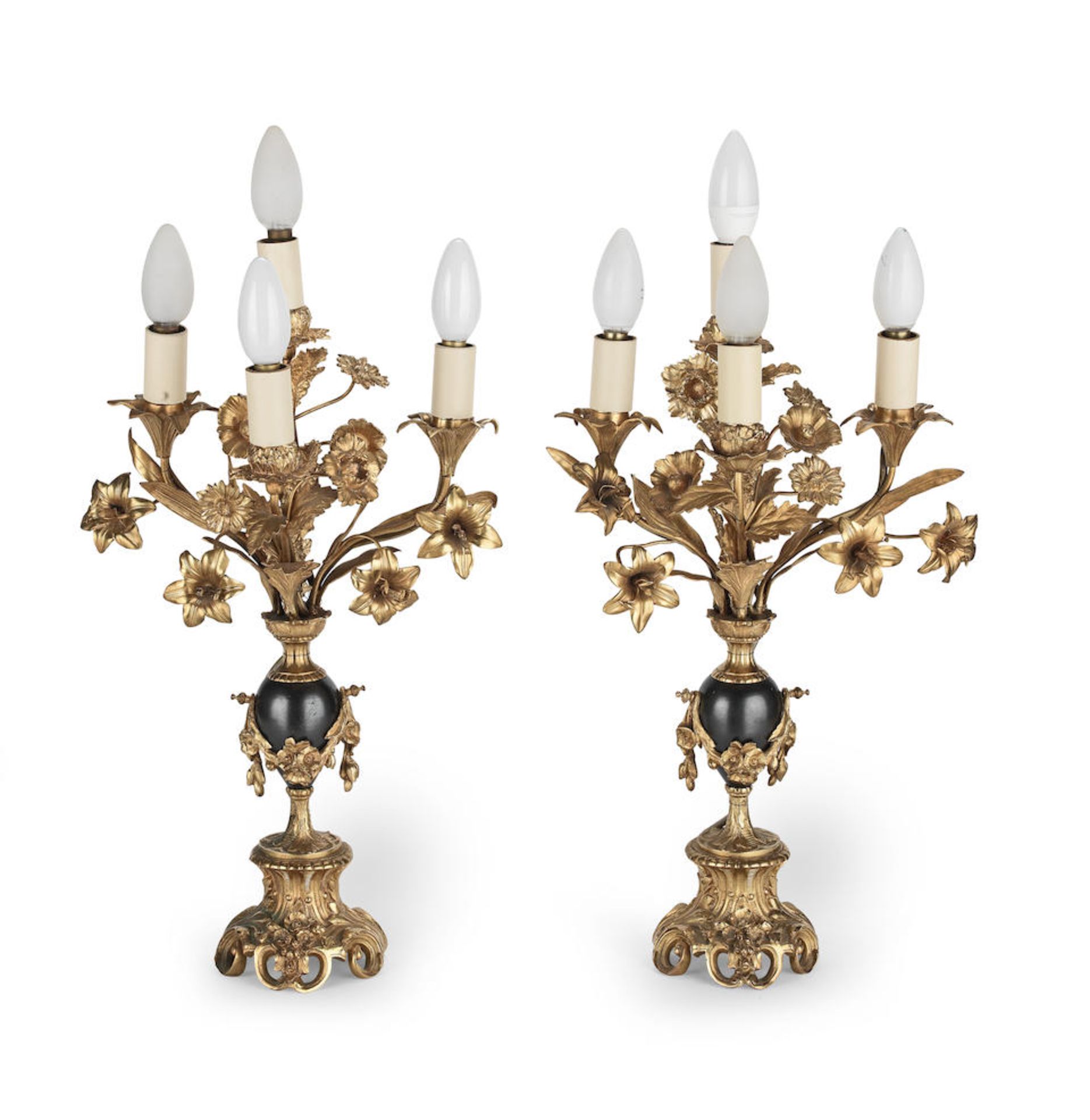 A pair of late 19th century French gilt bronze mounted four-light garniture candelabra (2)