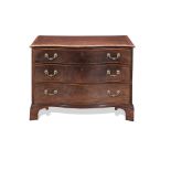 A George III mahogany serpentine chest of attractively low proportions